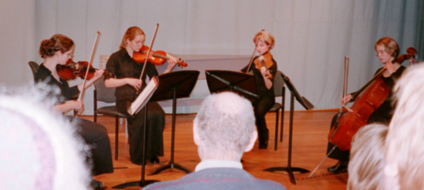 Fiona, Me, Brigette and Meisha playing in our quartet at the Winter String school at the conservatorium 2002