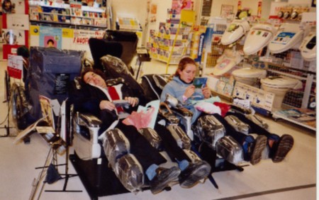 I tell ya these massage chairs are the best inventions ever! This is me and Dad in a department store in Japan and I am checking out my new Michelle Branch CD