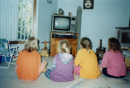 Nat, Stephanie, me and Rebecca watching the LIttle Mermaid. I don't know if they actually liked it, but I did - so they had to watch it! =)